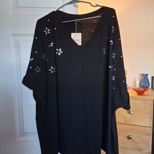 BloomChic Black Top with Floral Embellisments